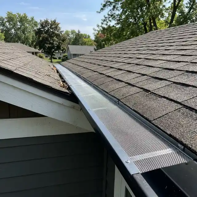 Stainless steel micro-mesh gutter guard installation in Fort Sanders TN near UT Campus.